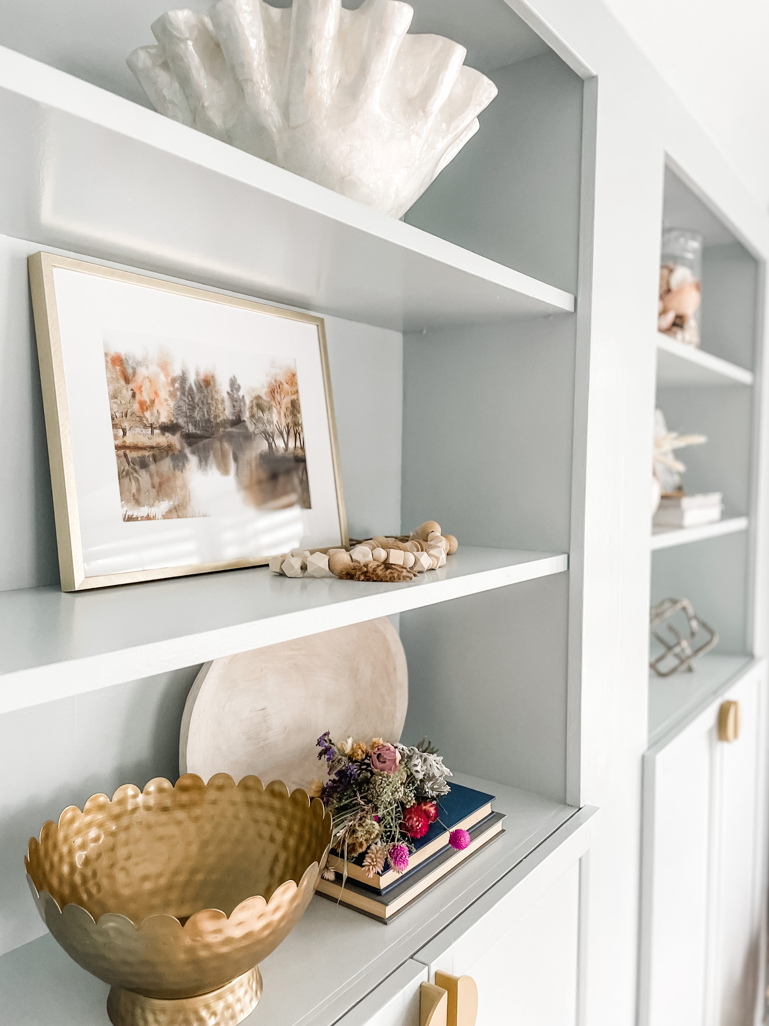 How to decorate the back of a bookcase + easy shelf liners for the