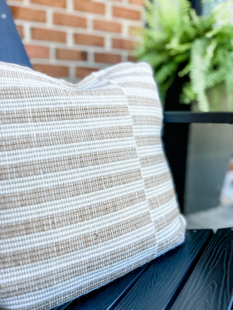 Welcoming Front Porch tan striped outdoor pillows