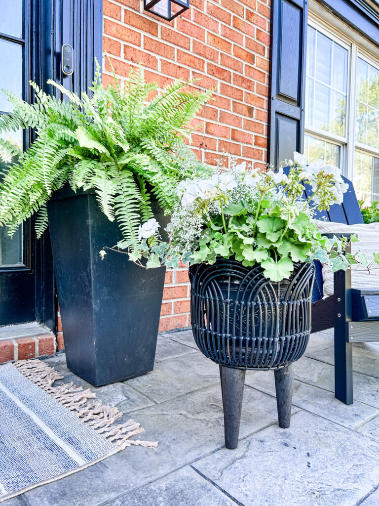 Welcoming Front Porch black tripod planters